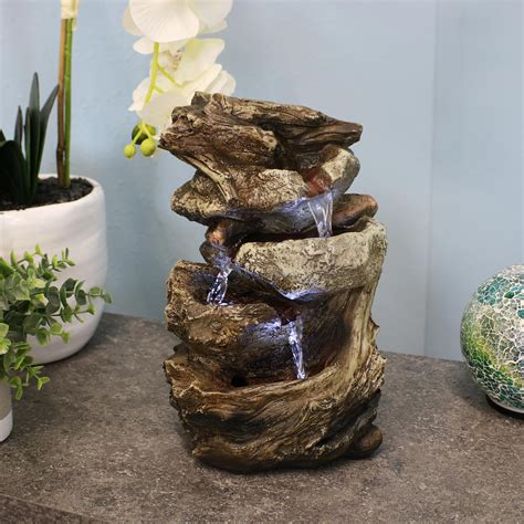 Create a peaceful, meditative atmosphere even in an urban jungle as you rejuvenate with this soothing waterfall fountain. . Tabletop waterfall
